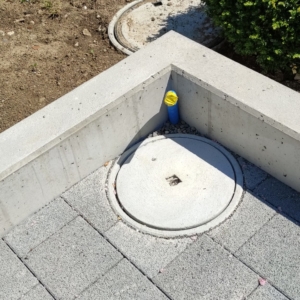 Betonsockel-Verbundsteinanpassung